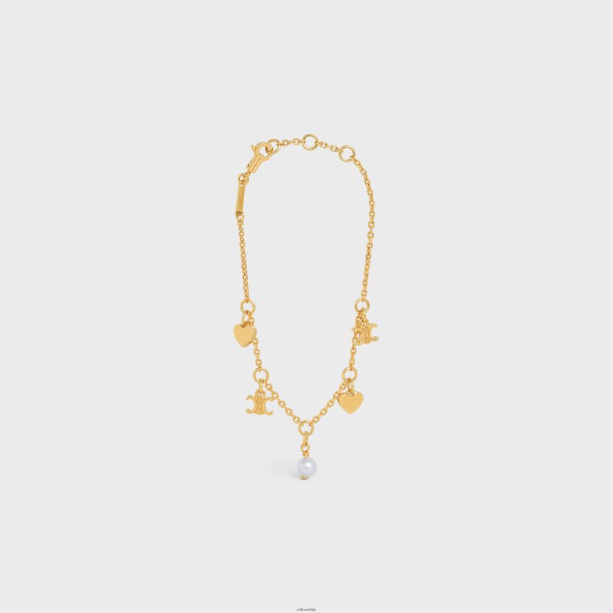 цоеур цхармс наруквица од месинга са златном завршном обрадом и смолним бисером злато/слонова кост CELINE Z2BBHT1364 Прибор Жене